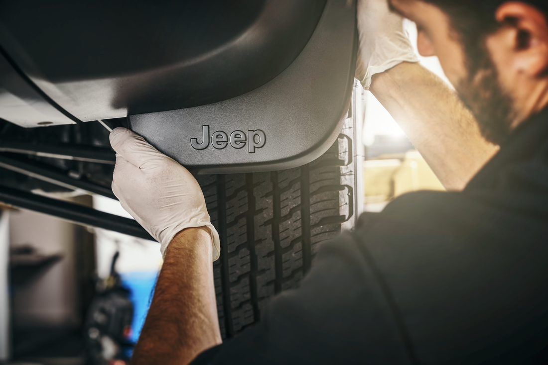 Jeep navigating rugged terrain