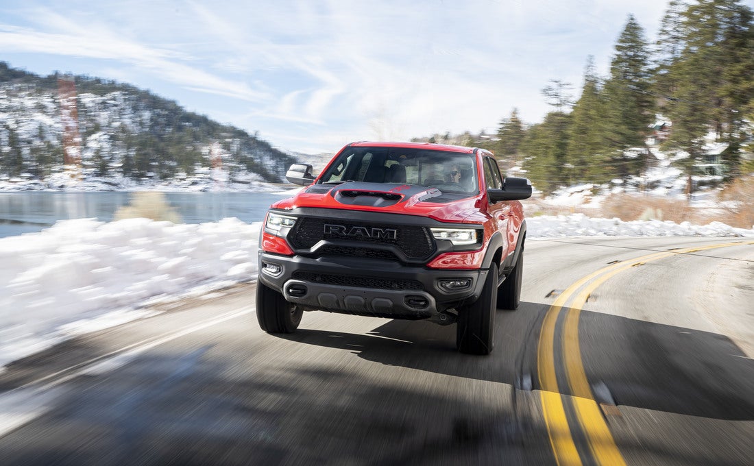 Ram 1500 4x4 truck driving in deep Wyoming snow